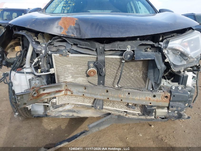 2017 Toyota Rav4 Le VIN: 2T3BFREV3HW597040 Lot: 12453411