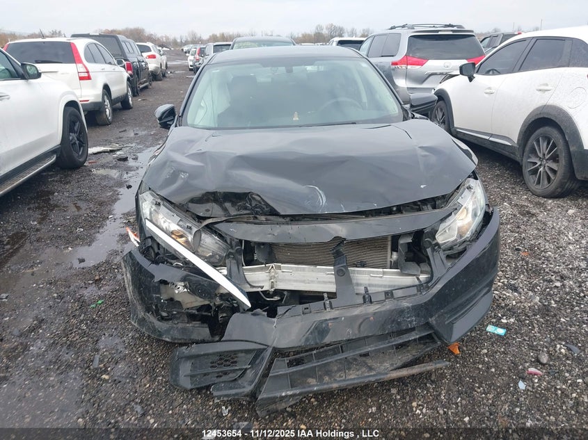 2018 Honda Civic Lx VIN: 2HGFC2F59JH030192 Lot: 12453654