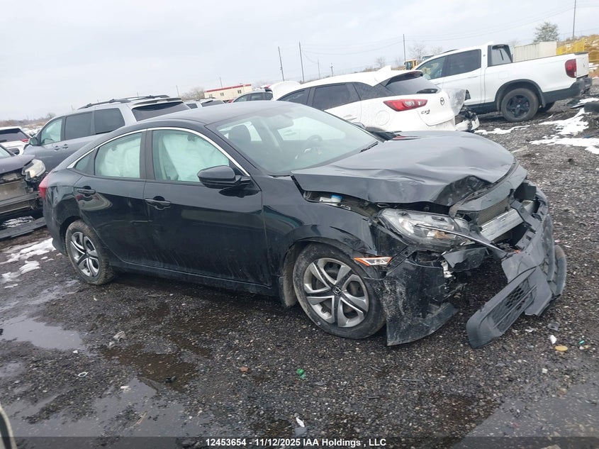 2018 Honda Civic Lx VIN: 2HGFC2F59JH030192 Lot: 12453654