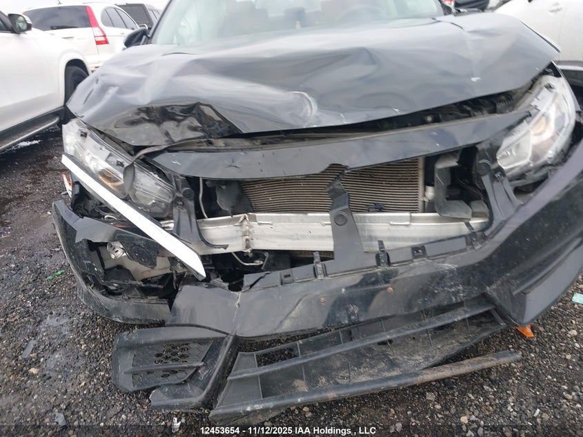 2018 Honda Civic Lx VIN: 2HGFC2F59JH030192 Lot: 12453654