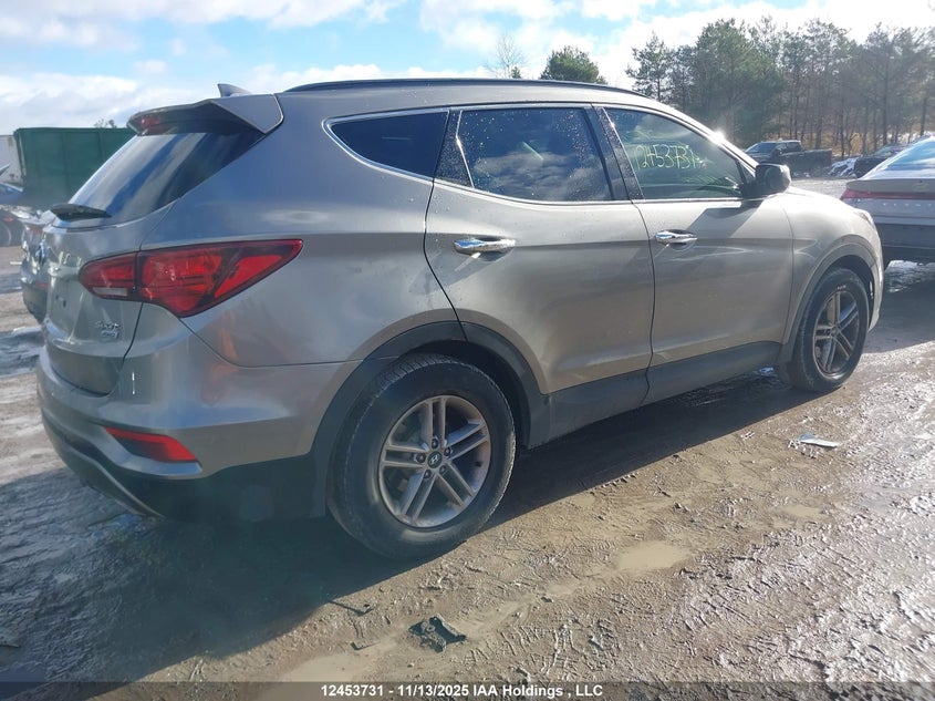 5NMZUDLB6JH061466 2018 HYUNDAI SANTA FE photo no. 4
