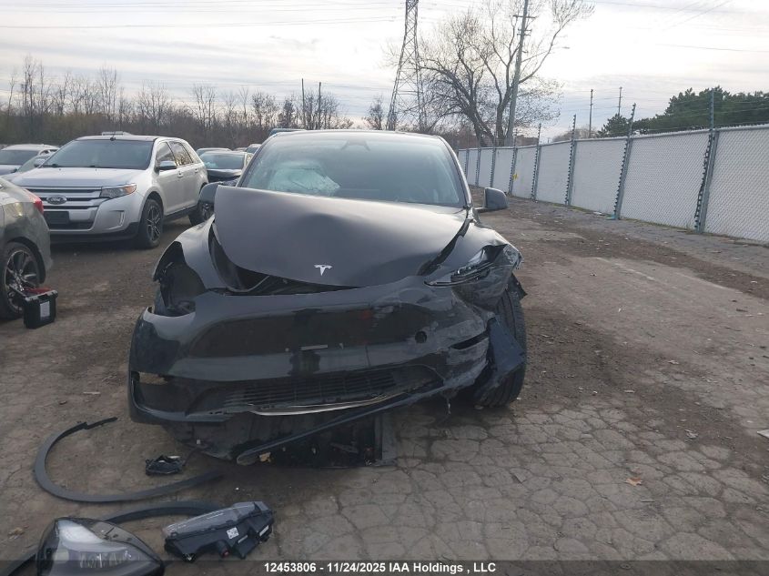 2024 Tesla Model Y Long Range VIN: 7SAYGDEEXRF019473 Lot: 12453806