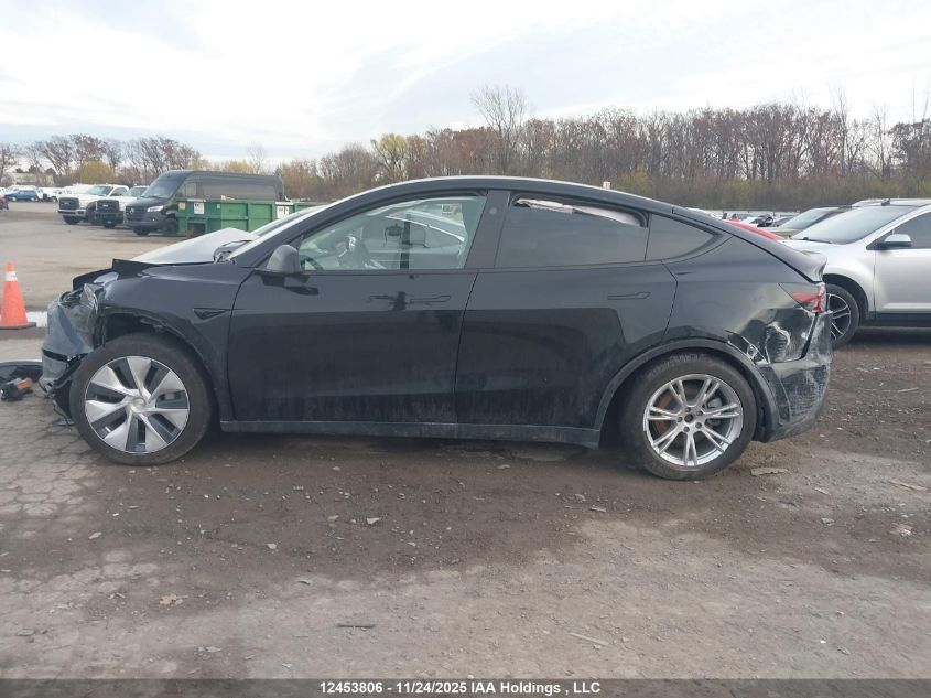 2024 Tesla Model Y Long Range VIN: 7SAYGDEEXRF019473 Lot: 12453806