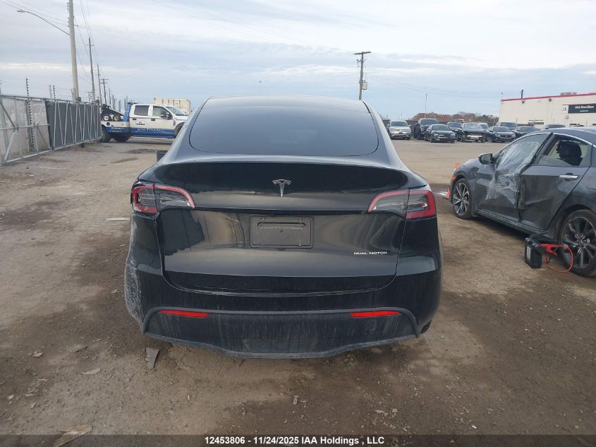 2024 Tesla Model Y Long Range VIN: 7SAYGDEEXRF019473 Lot: 12453806