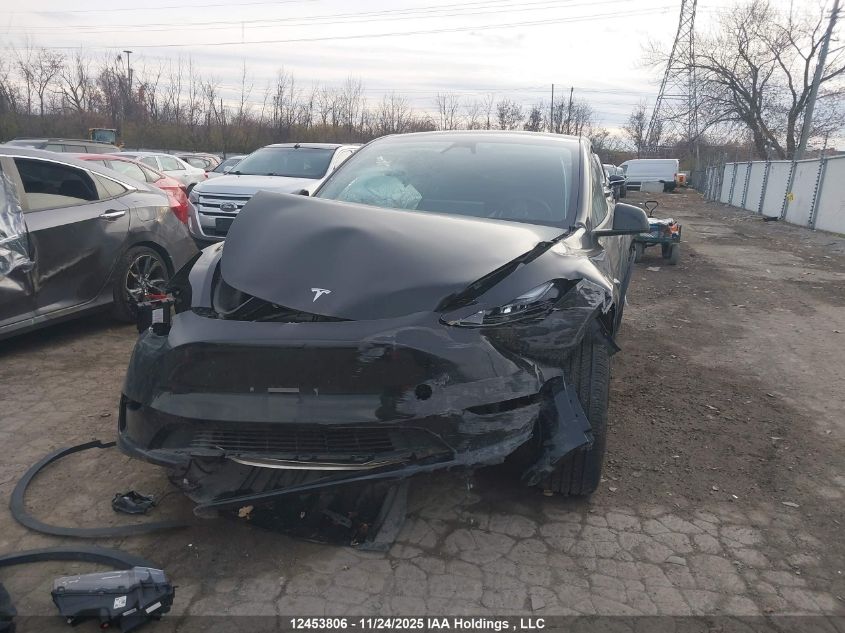 2024 Tesla Model Y Long Range VIN: 7SAYGDEEXRF019473 Lot: 12453806