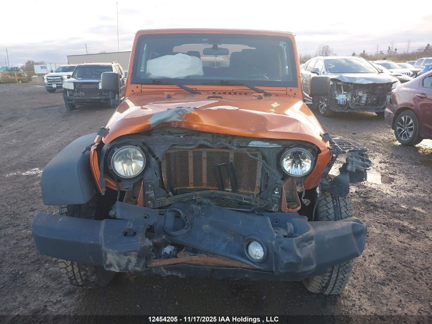 2011 Jeep Wrangler Sport VIN: 1J4AA2D16BL594623 Lot: 12454205