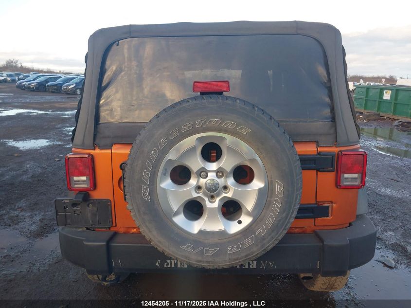 2011 Jeep Wrangler Sport VIN: 1J4AA2D16BL594623 Lot: 12454205