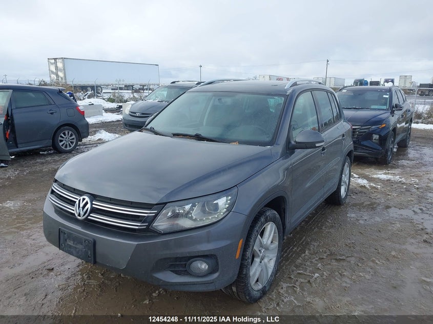 WVGJV3AXXEW584197 2014 VOLKSWAGEN TIGUAN photo no. 2