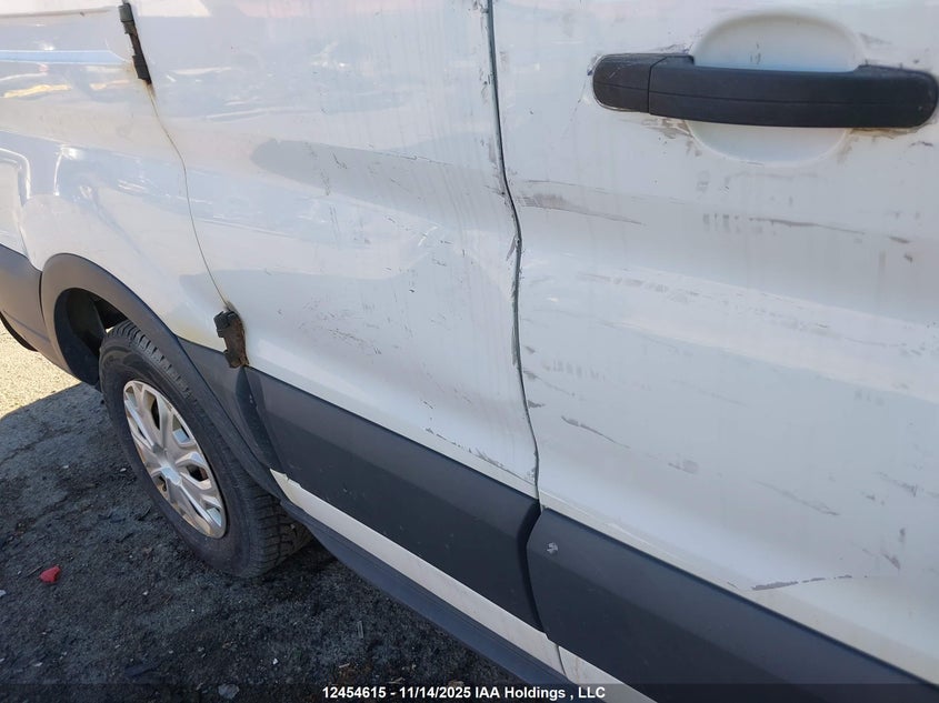 2015 Ford Transit T-150 VIN: 1FTYE1ZMXFKA74149 Lot: 12454615