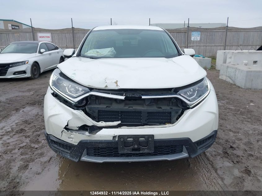 2018 Honda Cr-V Lx VIN: 2HKRW1H34JH001313 Lot: 12454932