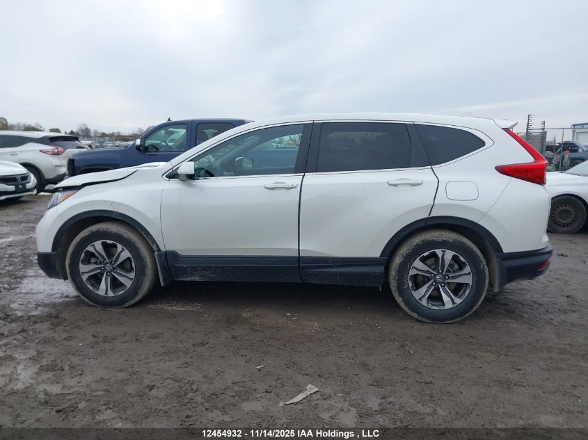 2018 Honda Cr-V Lx VIN: 2HKRW1H34JH001313 Lot: 12454932