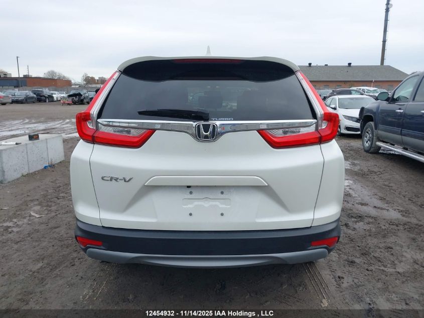2018 Honda Cr-V Lx VIN: 2HKRW1H34JH001313 Lot: 12454932