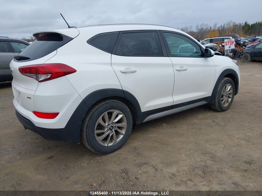 KM8J3CA42HU361356 2017 HYUNDAI TUCSON photo no. 4