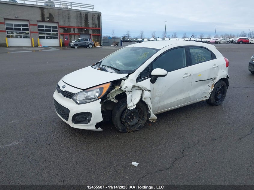 KNADM5A32D6770311 2013 KIA RIO photo no. 2