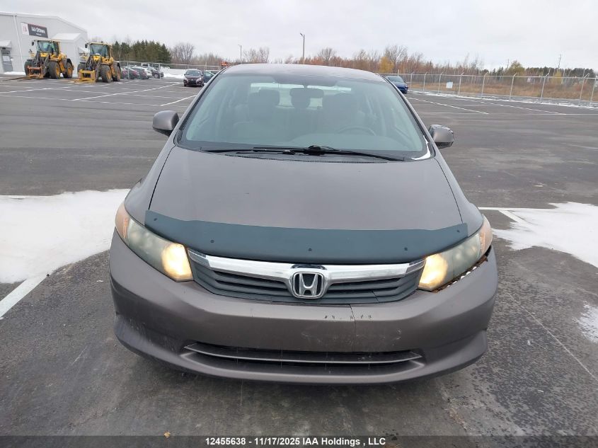 2012 Honda Civic VIN: 2HGFB2E47CH020579 Lot: 12455638