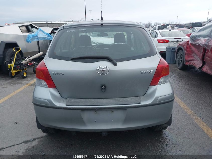 2009 Toyota Yaris VIN: JTDKT923295275381 Lot: 12455947