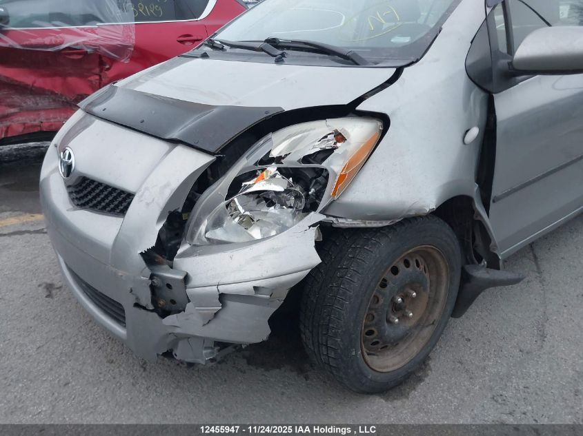 2009 Toyota Yaris VIN: JTDKT923295275381 Lot: 12455947