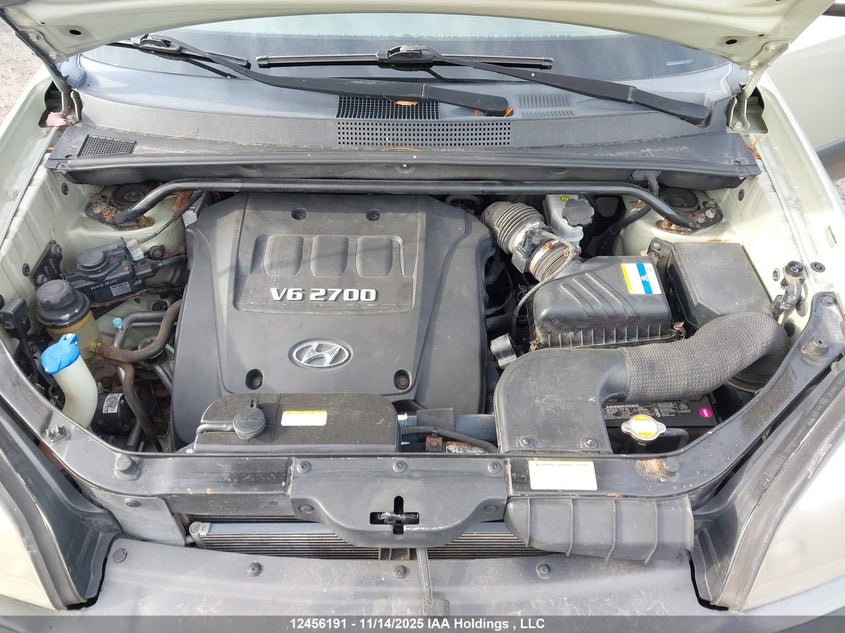 2007 Hyundai Tucson Gl VIN: KM8JM12D27U673398 Lot: 12456191