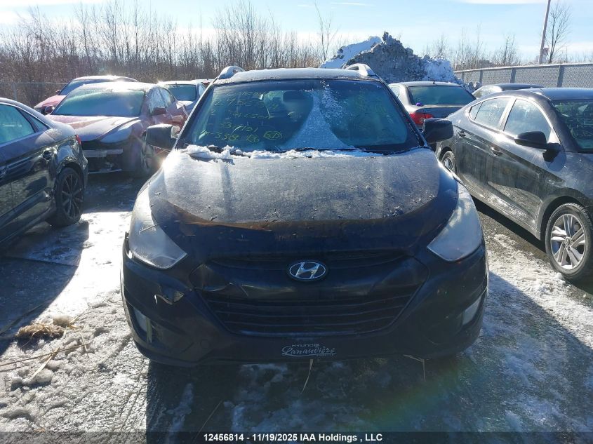 2012 Hyundai Tucson Gls VIN: KM8JUCAC2CU336101 Lot: 12456814