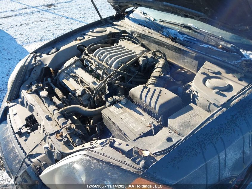 2004 Hyundai Tiburon Gt VIN: KMHHN65F34U135410 Lot: 12456905