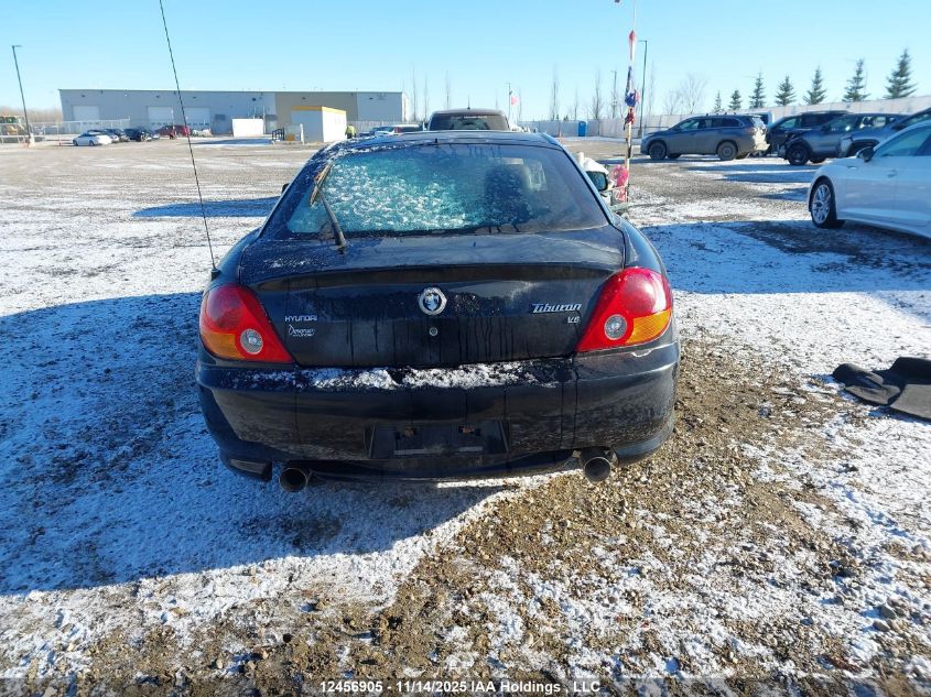 2004 Hyundai Tiburon Gt VIN: KMHHN65F34U135410 Lot: 12456905