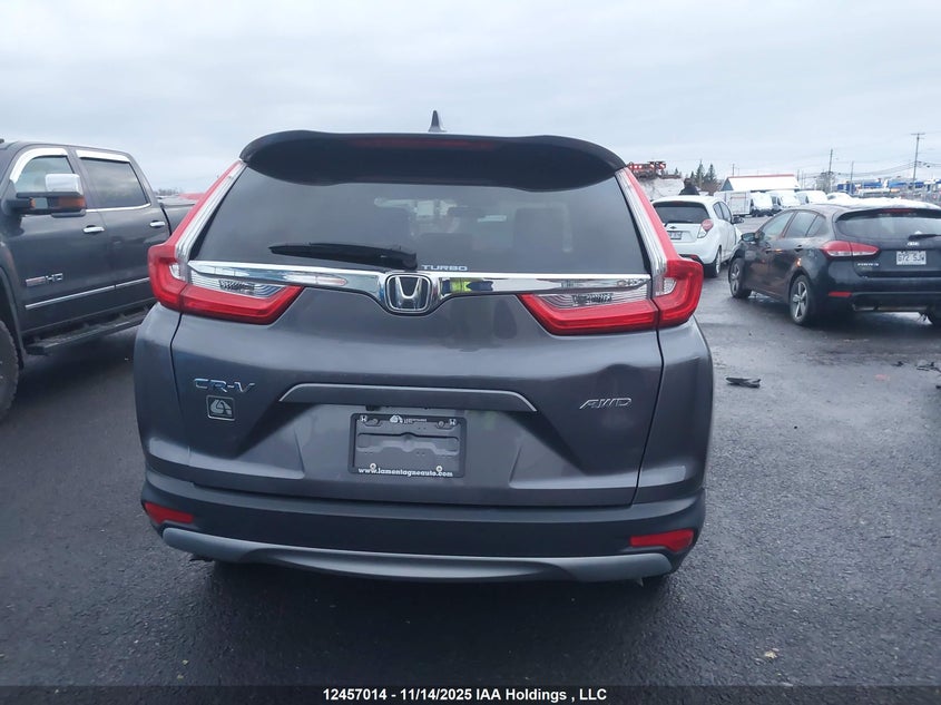 2019 Honda Cr-V Lx VIN: 2HKRW2H21KH146811 Lot: 12457014