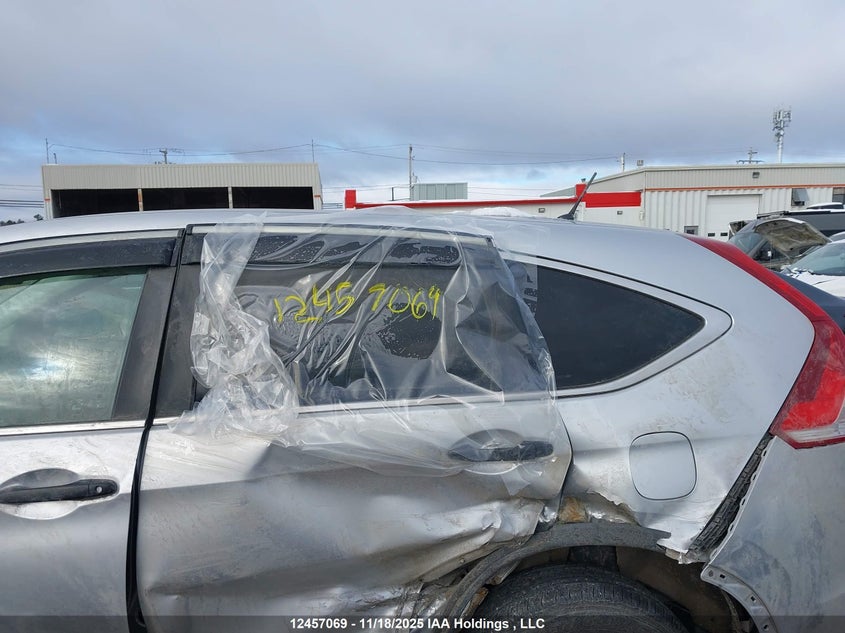 2014 Honda Cr-V Lx VIN: 2HKRM4H35EH130335 Lot: 12457069