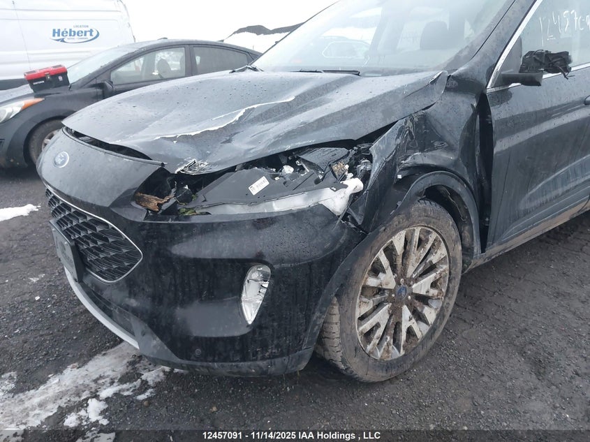 2022 Ford Escape Titanium VIN: 1FMCU9J93NUB75034 Lot: 12457091