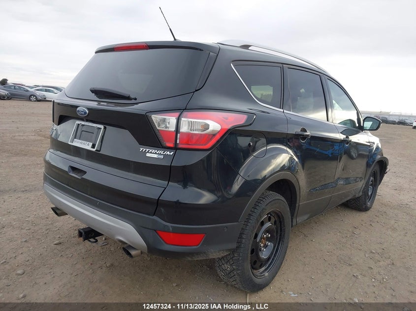 1FMCU9J99HUD46003 2017 FORD ESCAPE photo no. 4