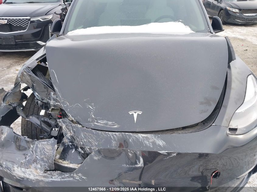 2024 Tesla Model Y Long Range VIN: 7SAYGDEEXRF991591 Lot: 12457565