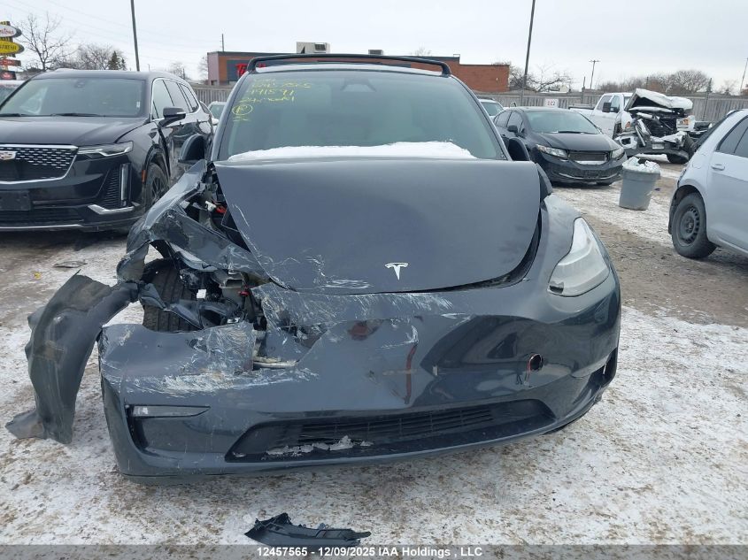 2024 Tesla Model Y Long Range VIN: 7SAYGDEEXRF991591 Lot: 12457565