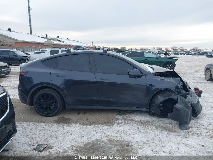 2024 Tesla Model Y Long Range VIN: 7SAYGDEEXRF991591 Lot: 12457565