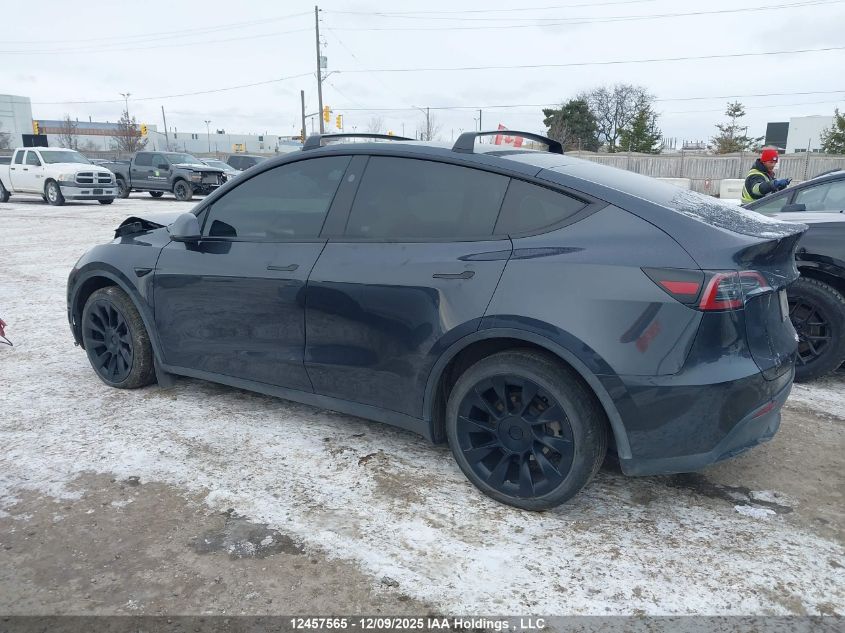 2024 Tesla Model Y Long Range VIN: 7SAYGDEEXRF991591 Lot: 12457565