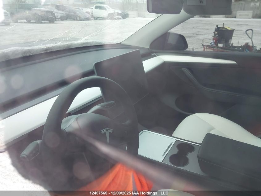 2024 Tesla Model Y Long Range VIN: 7SAYGDEEXRF991591 Lot: 12457565