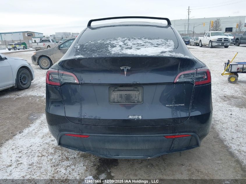 2024 Tesla Model Y Long Range VIN: 7SAYGDEEXRF991591 Lot: 12457565