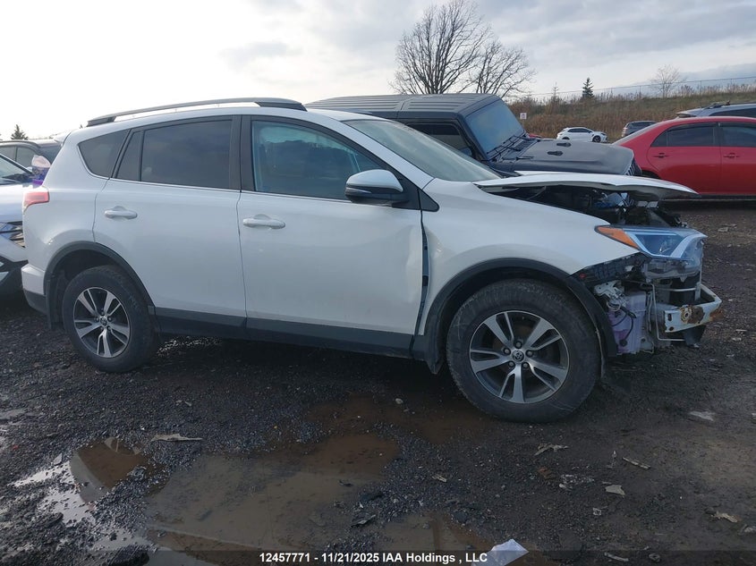 2018 Toyota Rav4 Le VIN: 2T3BFREV8JW696653 Lot: 12457771