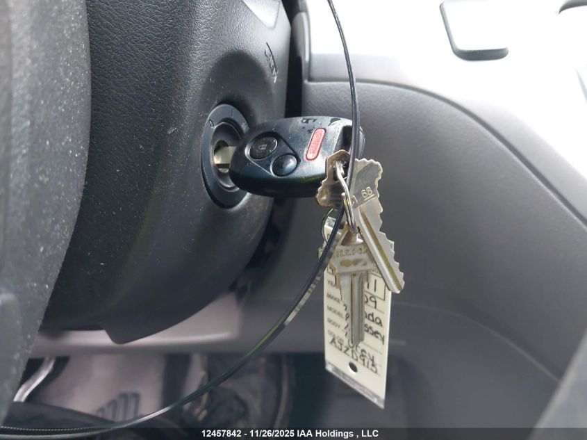 2009 Honda Odyssey VIN: 5FNRL38229B504182 Lot: 12457842