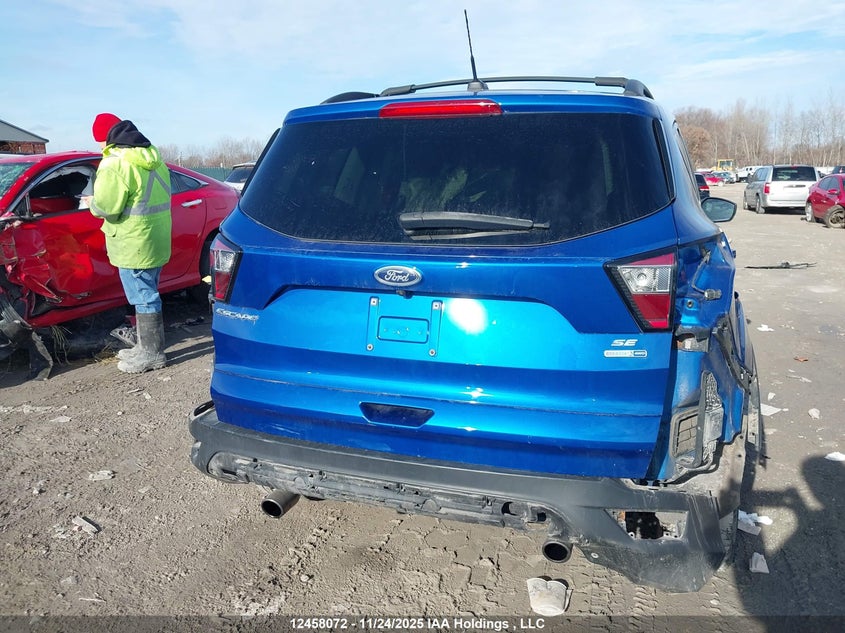 2018 Ford Escape VIN: 1FMCU9GD0JUD39894 Lot: 12458072