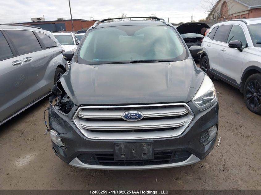 2018 Ford Escape VIN: 1FMCU9J92JUB17734 Lot: 12458259