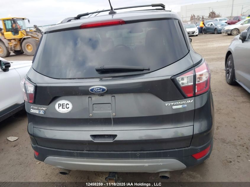 2018 Ford Escape VIN: 1FMCU9J92JUB17734 Lot: 12458259