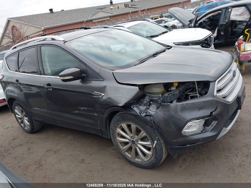 2018 Ford Escape VIN: 1FMCU9J92JUB17734 Lot: 12458259