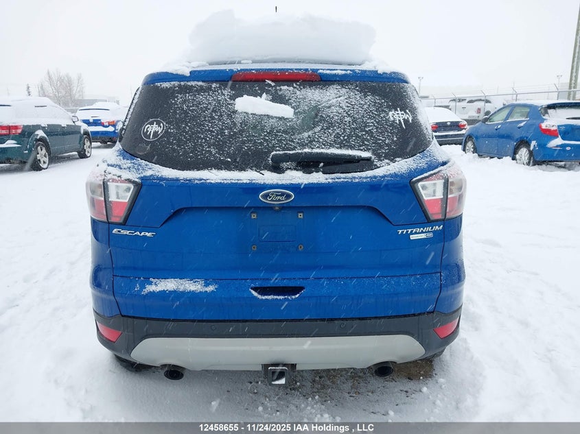 2017 Ford Escape Titanium VIN: 1FMCU9J93HUD80034 Lot: 12458655
