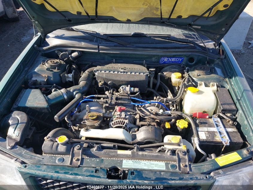 1999 Subaru Forester L VIN: JF1SF6351XG704295 Lot: 12460877