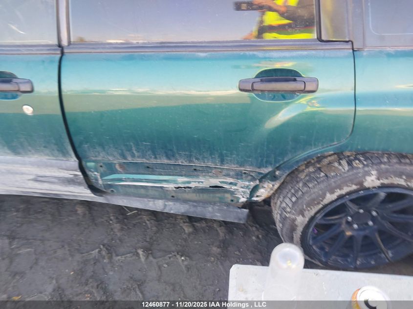 1999 Subaru Forester L VIN: JF1SF6351XG704295 Lot: 12460877