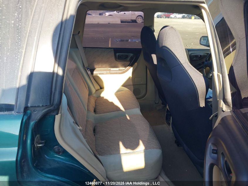 1999 Subaru Forester L VIN: JF1SF6351XG704295 Lot: 12460877