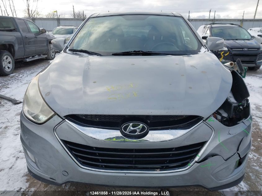 2011 Hyundai Tucson Gls/Limited VIN: KM8JUCAC9BU170318 Lot: 12461858