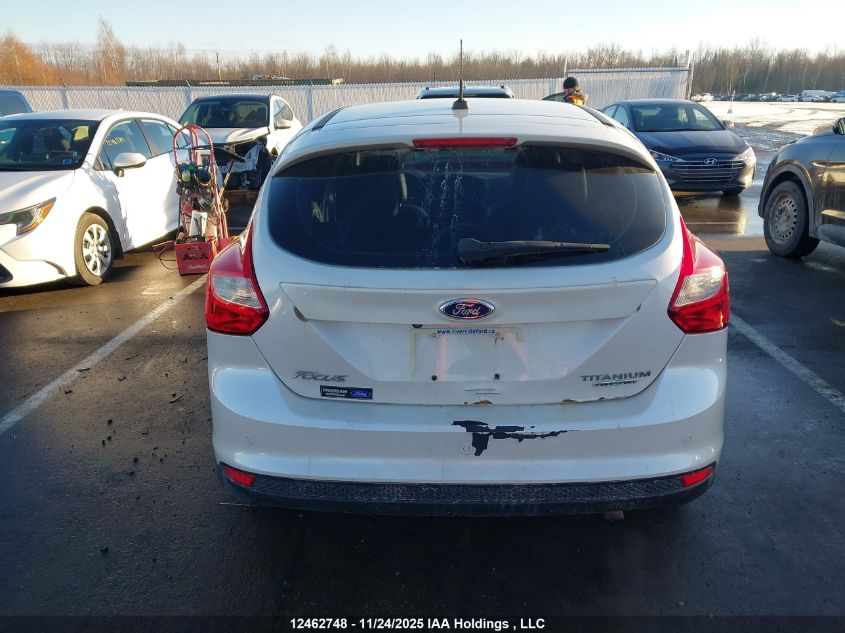 2014 Ford Focus VIN: 1FADP3N27EL303121 Lot: 12462748