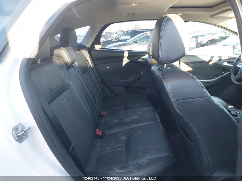 2014 Ford Focus VIN: 1FADP3N27EL303121 Lot: 12462748