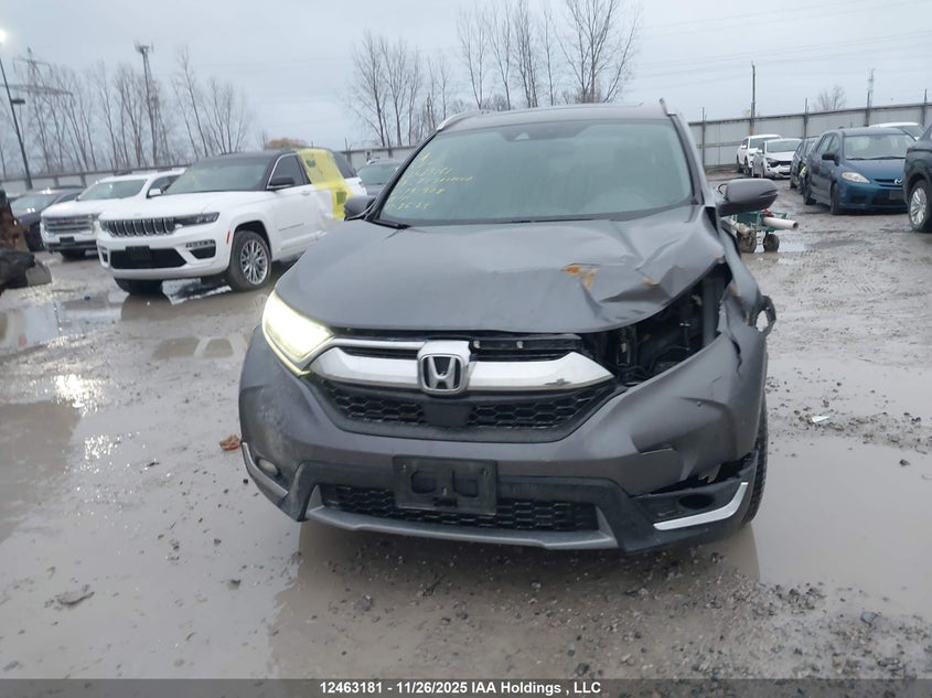 2019 Honda Cr-V Touring VIN: 2HKRW2H99KH131308 Lot: 12463181