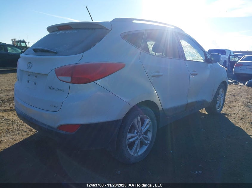 KM8JUCAC5CU495288 2012 HYUNDAI TUCSON photo no. 4